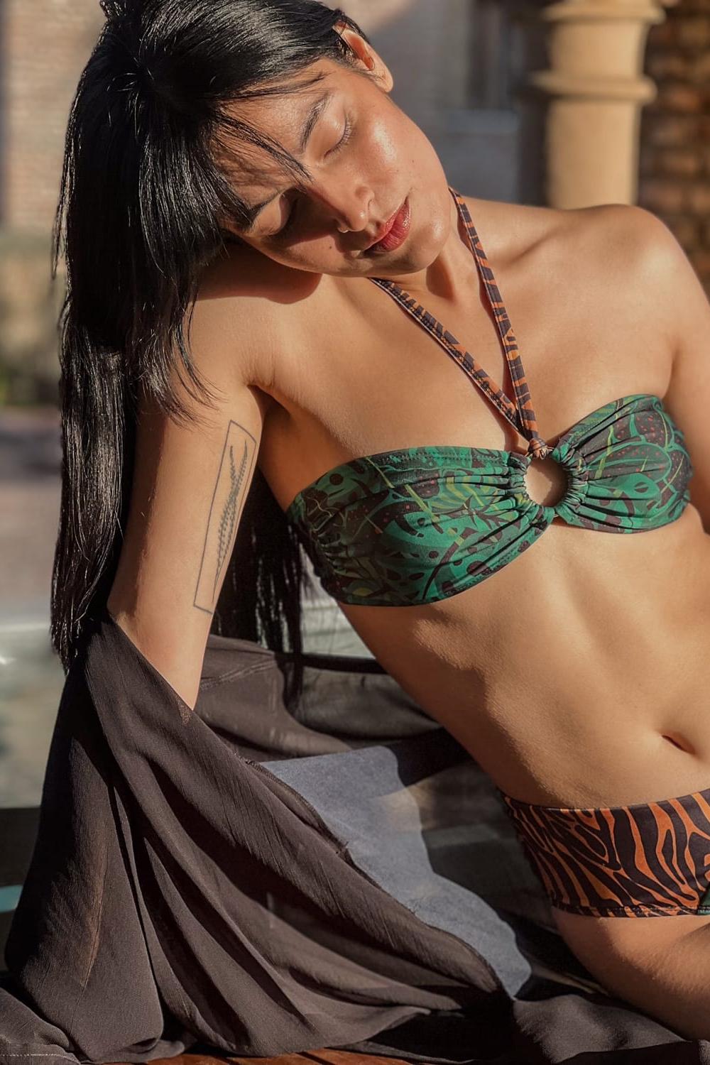 A variety of stylish swimwear including swim suits, monokinis, and bikini dresses; featuring swimming suits for women, swim suits for ladies, swimdresses for women, swimdress for women, and swimming dress for ladies – perfect for a chic beach day.