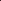 Woman wearing a burgundy evening gown against a dark red curtain